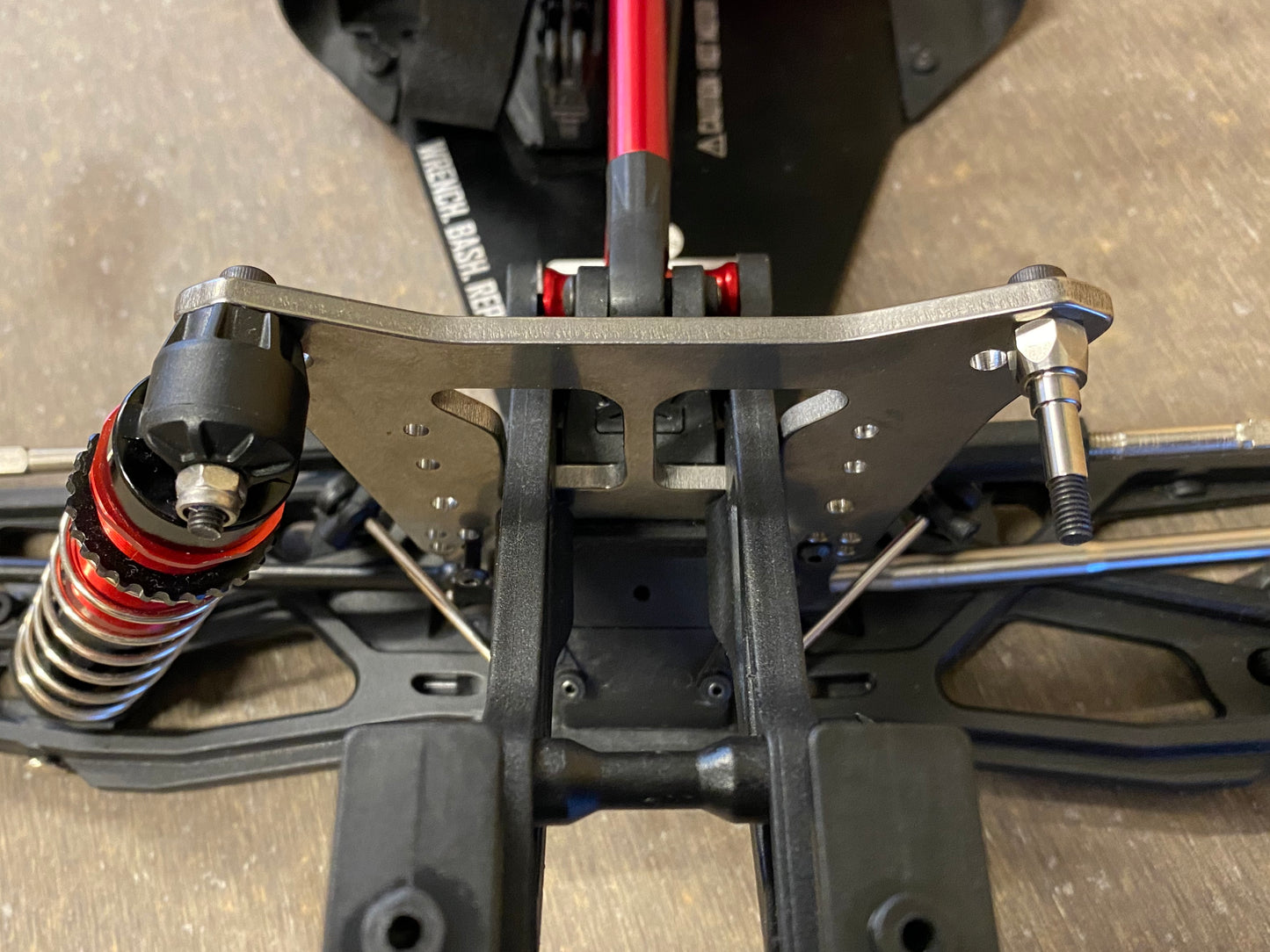 Titanium upgrade shock stand-offs, for Arrma 6s and 1/7th scale trucks.